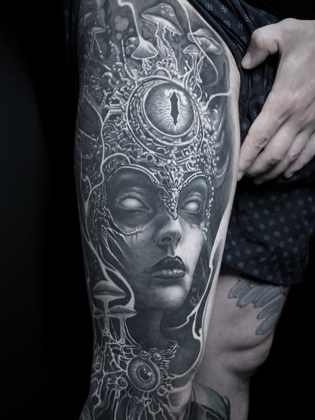 Surreal portrait with mushrooms and eyes realism tattoo on the forearm by Gabriel Londis