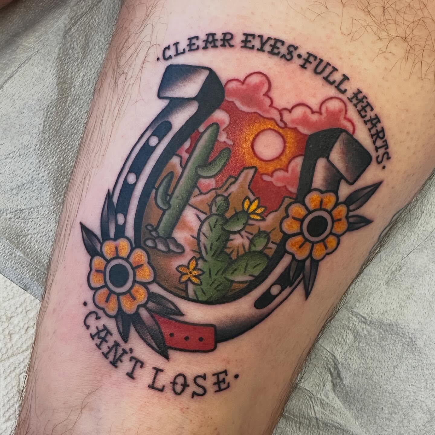 Horseshoe and cactus American traditional tattoo on the forearm by Katie Beth