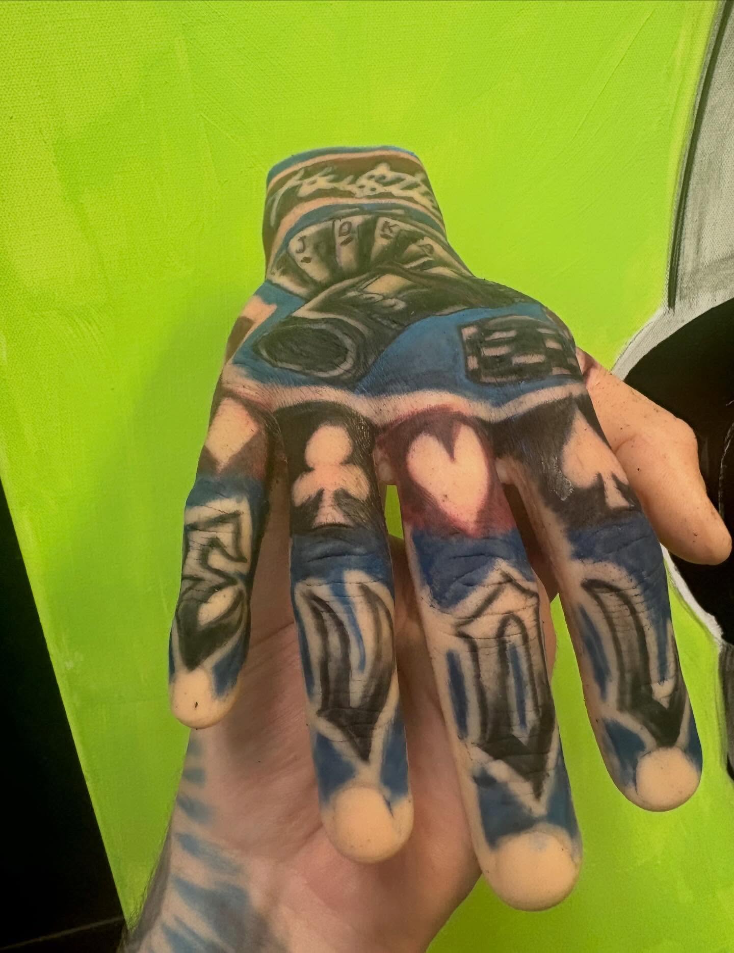 Playing cards American traditional tattoo on the hand by Tyler Cooper, Las Vegas, Nevada