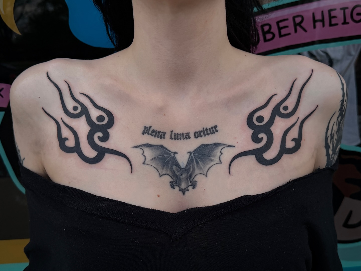 Bat and tribal flames tribal tattoo on the chest by Patrick Miller, Huber Heights, Ohio