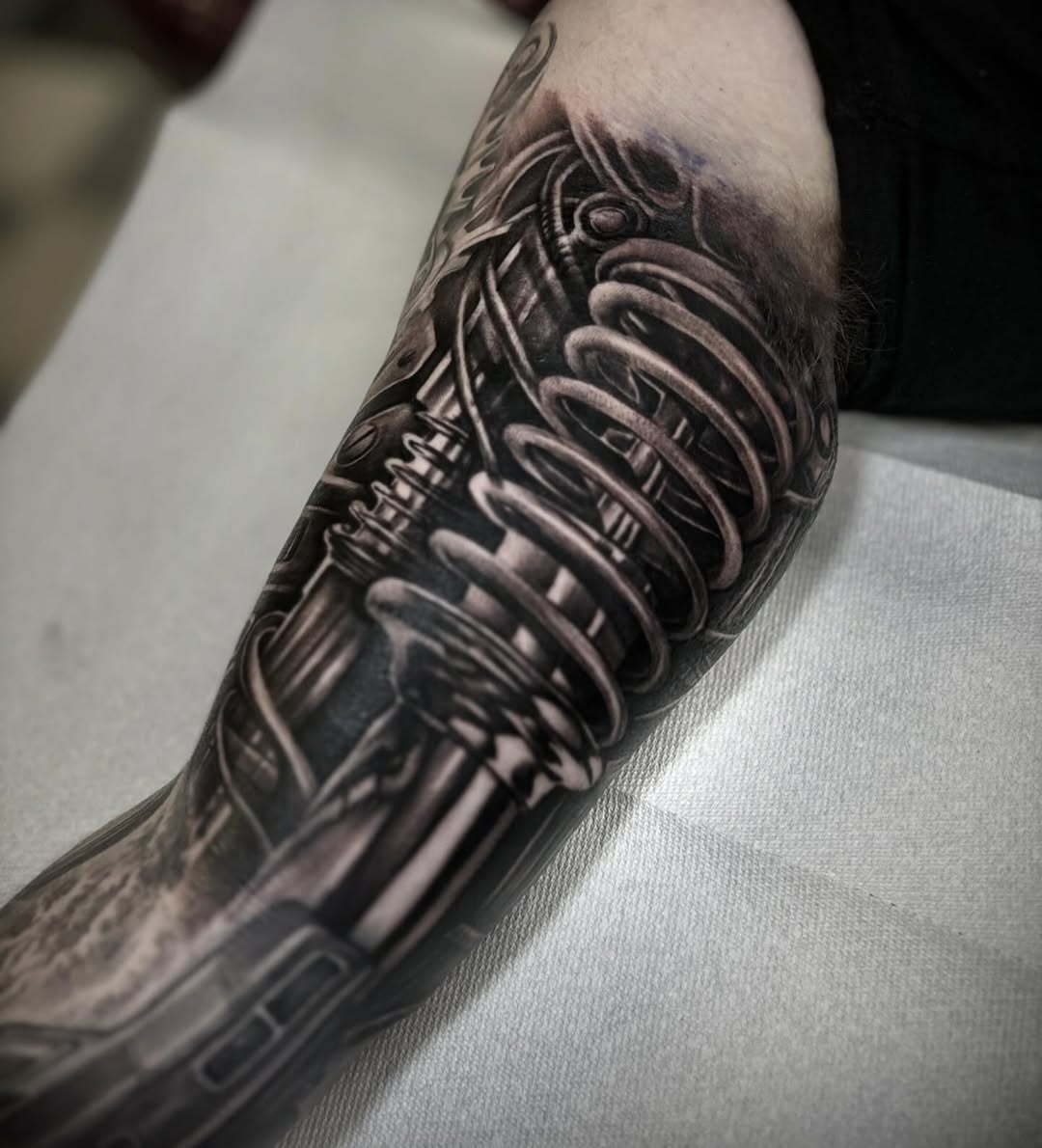 Biomechanical suspension system biomech tattoo on the forearm by ๐๐๐๐๐๐๐ ๐ฌ.๐ผ