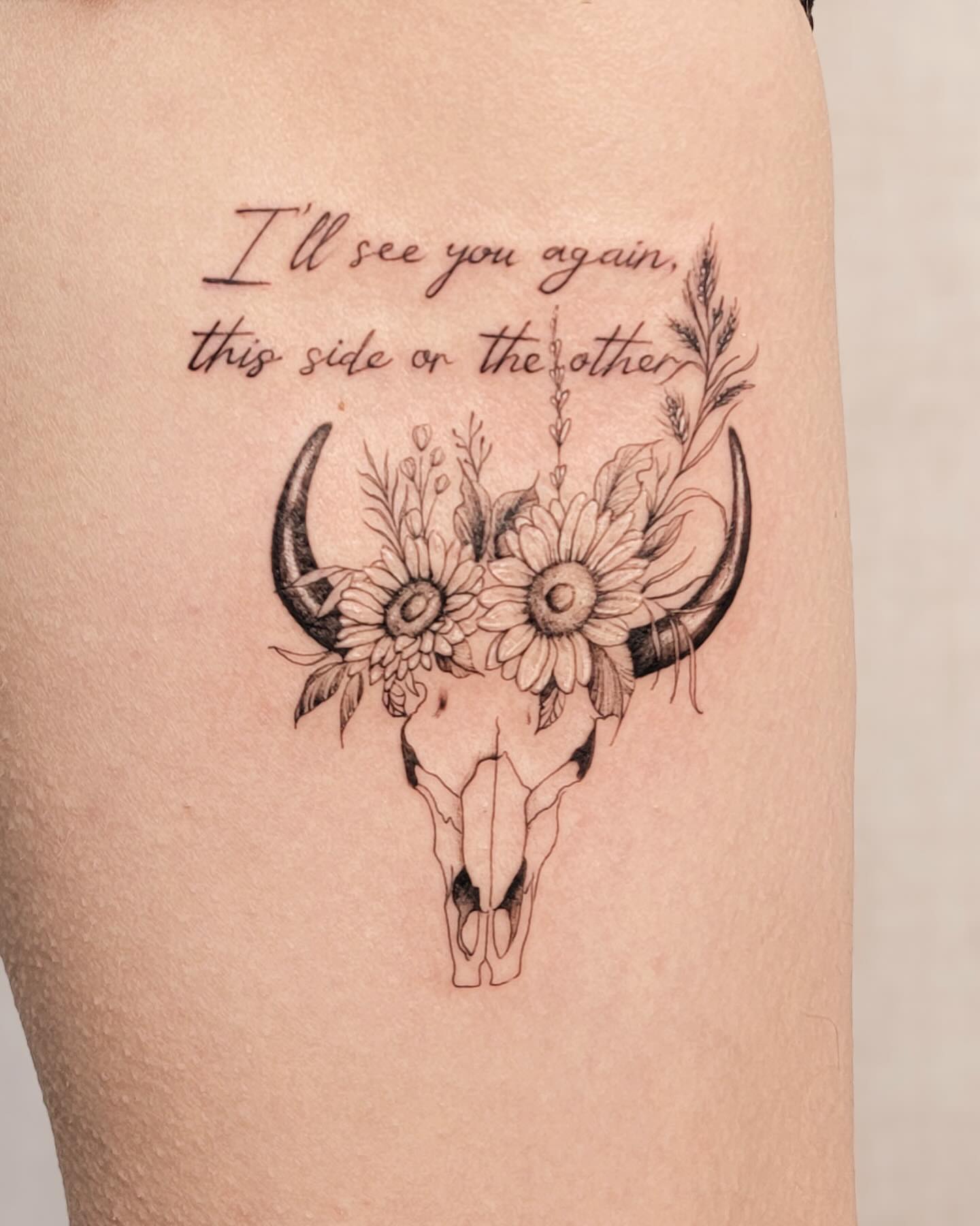 Sunflower skull ornamental tattoo on the thigh by Koko