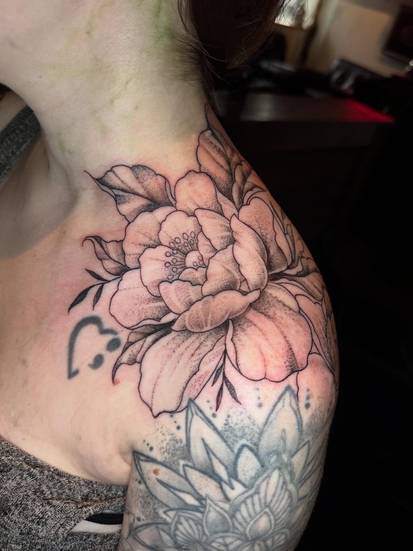 Peony dotwork tattoo on the shoulder by Gabrielle Mack