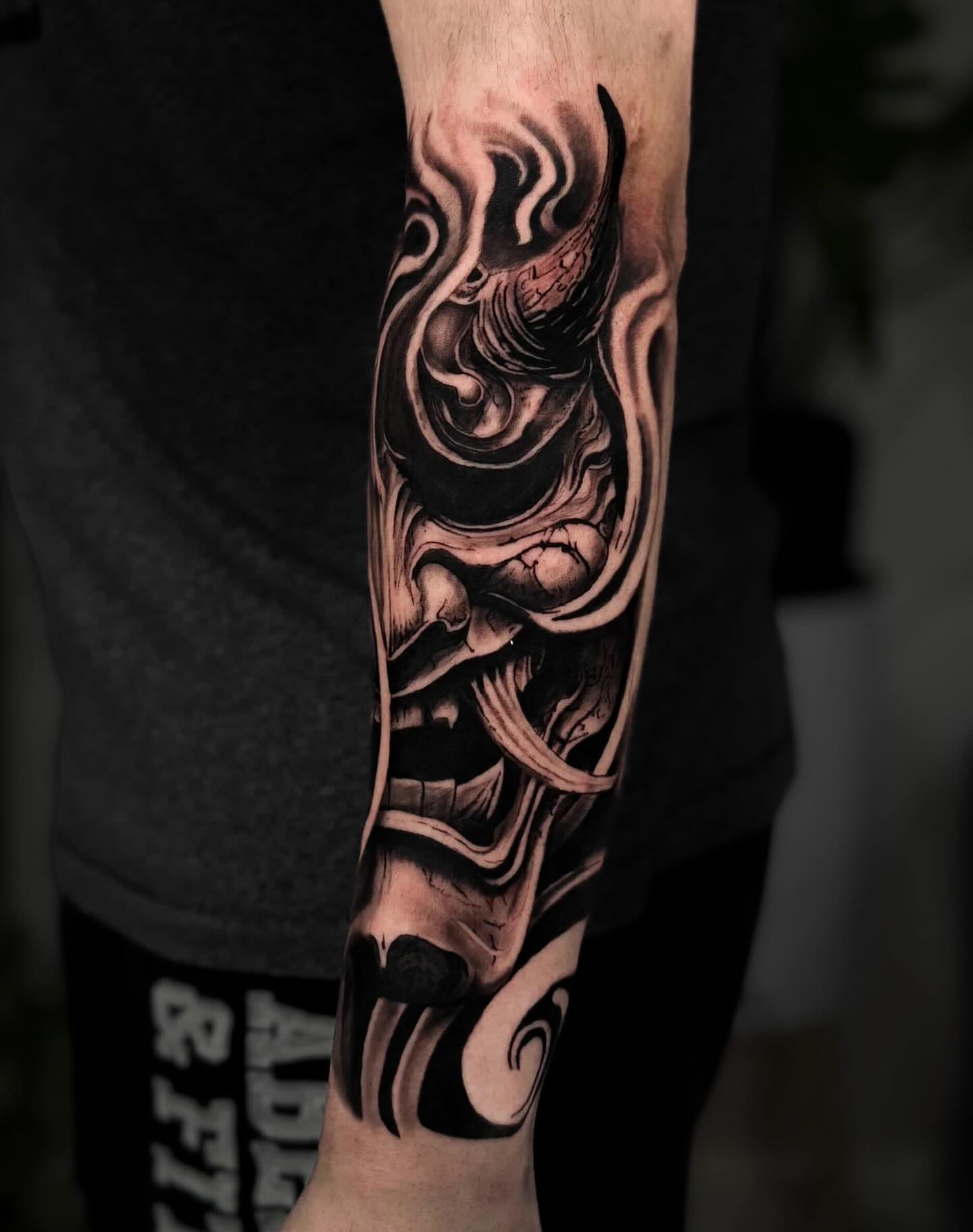 Abstract flame realism tattoo on the forearm by Kai, Charlotte, North Carolina