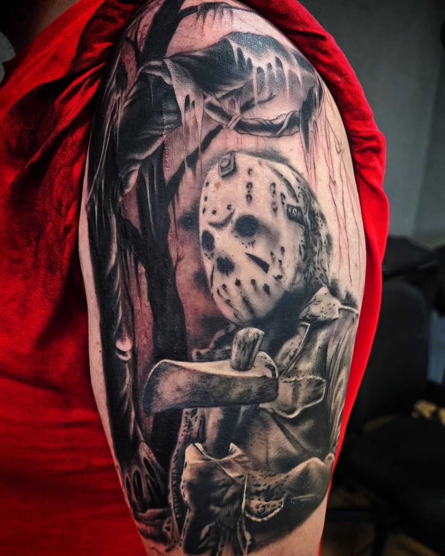 Jason voorhees realism tattoo on the upper arm by Nick Trammel