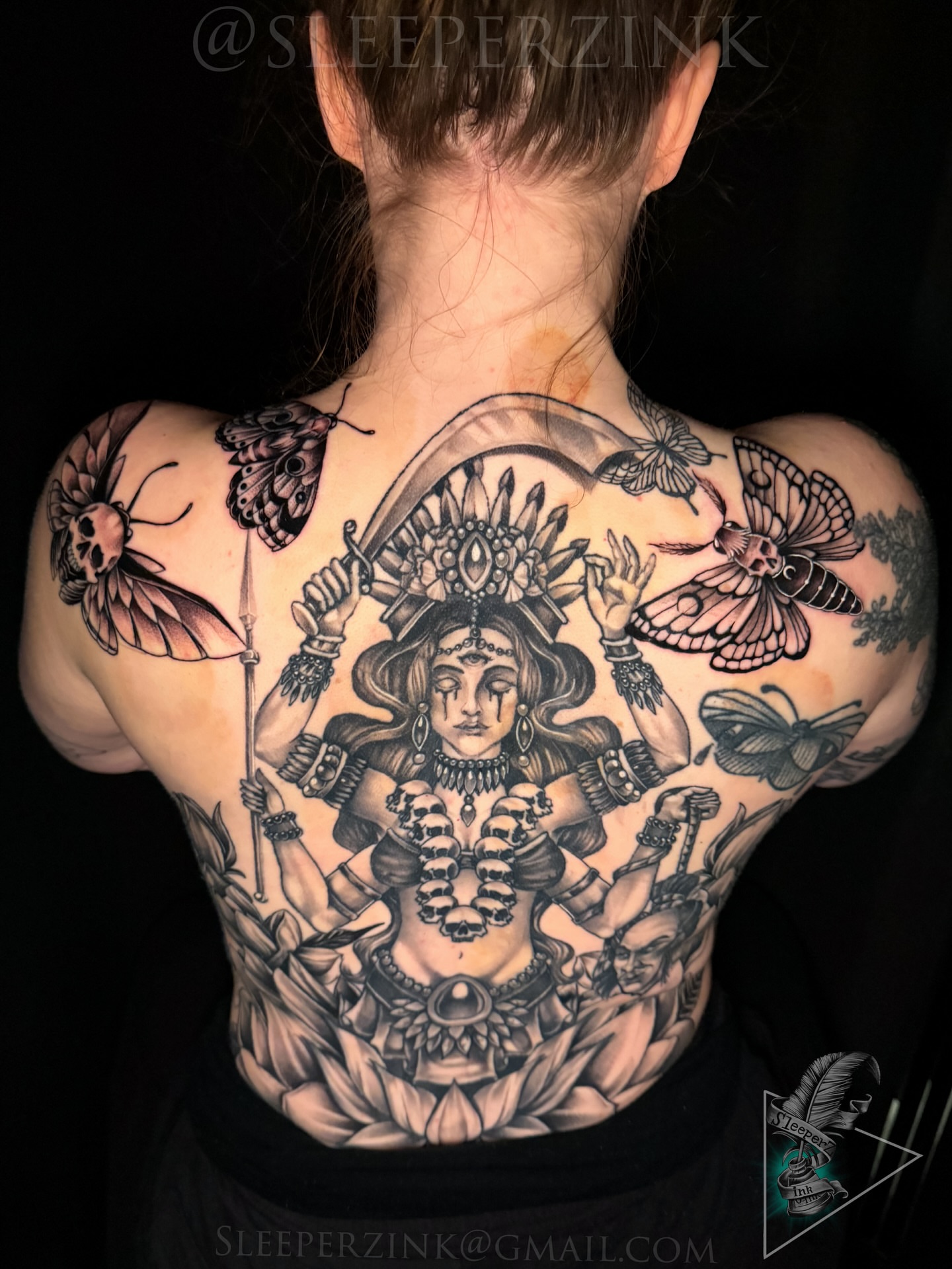 Hindu goddess realism tattoo on the back by Travis Sleeper