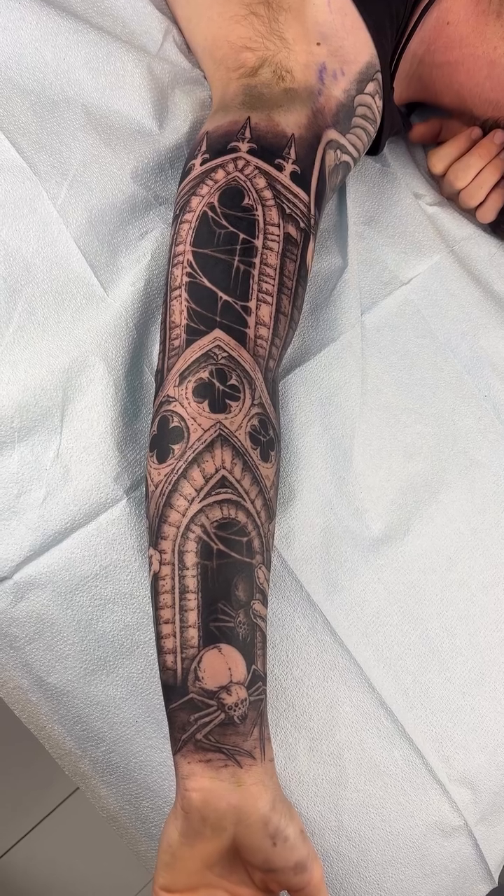 Cathedral window and skull dark realism tattoo by Hollow Priest