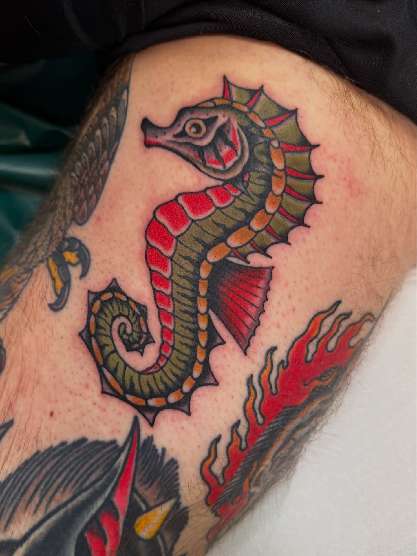 Seahorse American traditional tattoo on the thigh by Christopher Mikesell