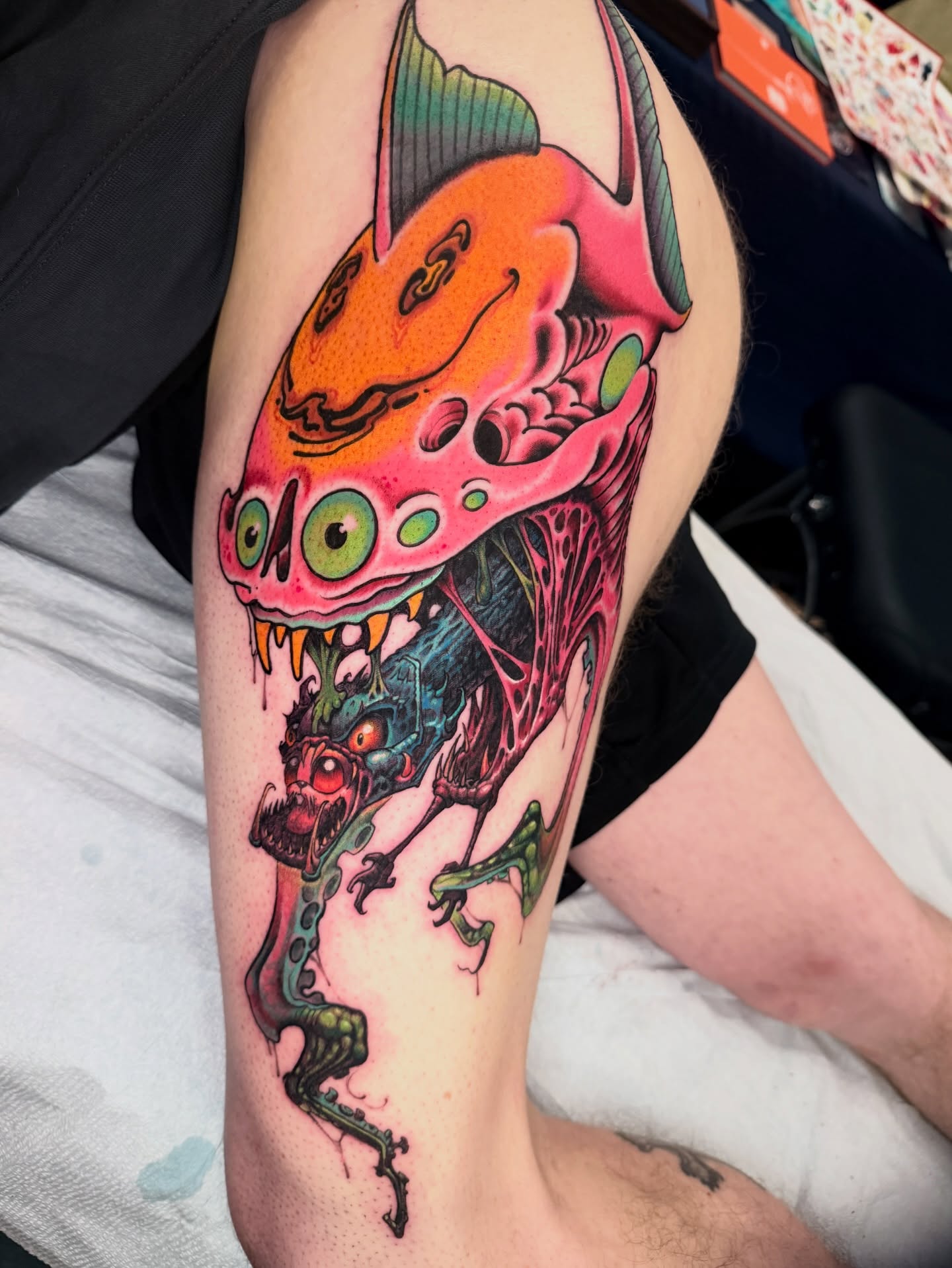 Monster new school tattoo on the thigh by JoshUA Bowers, Des Moines, Iowa