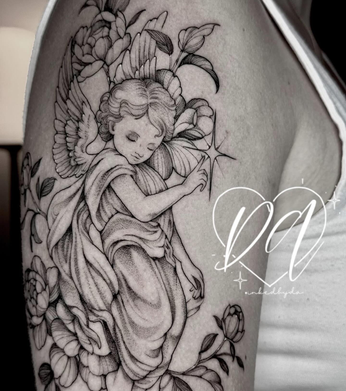 Angel with flowers realism tattoo on the forearm by Dalton Alexandria
