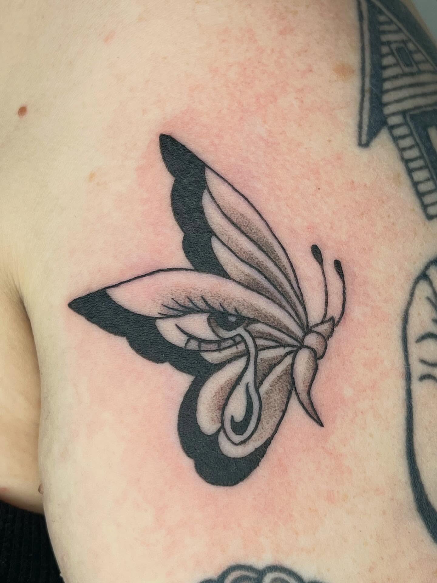 Butterfly black and grey tattoo on the shoulder by ashley π²