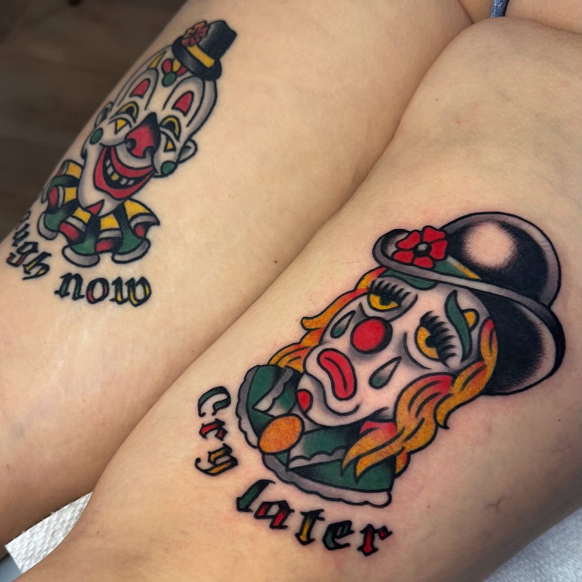 Clown American traditional tattoo on the thigh by Larry Love