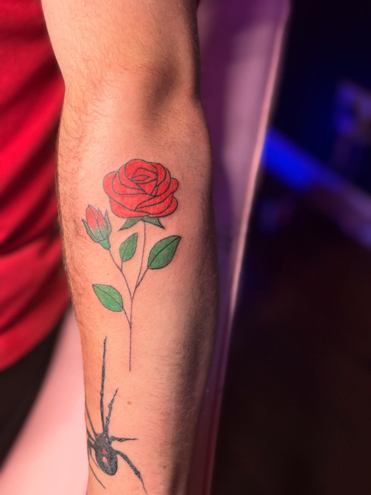 Rose realism tattoo on the forearm by Tattoos by Santos