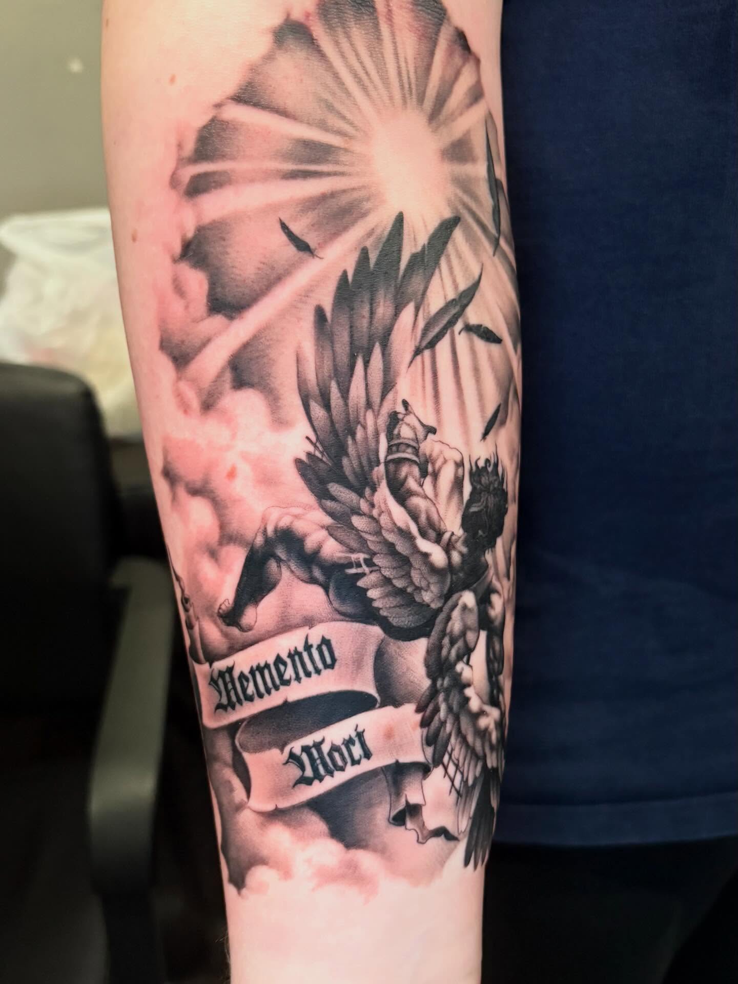 Memento mori realism tattoo on the forearm by Eddie Wolfe
