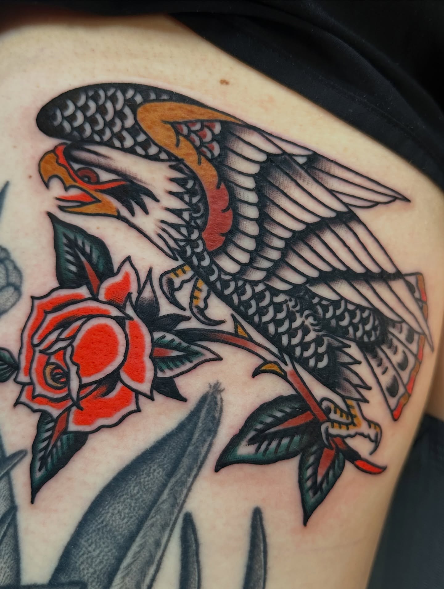 Eagle and rose American traditional tattoo on the shoulder by A.j. Lingerfeldt, Nashville, Tennessee