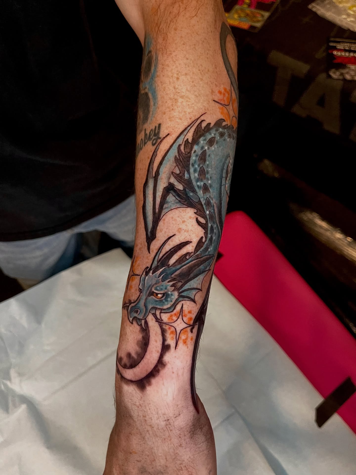 Dragon dotwork tattoo on the forearm by Jessica Burridge