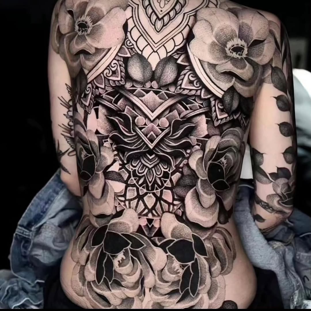 Full back floral and mandala geometric tattoo on the torso by miami tattoo artist