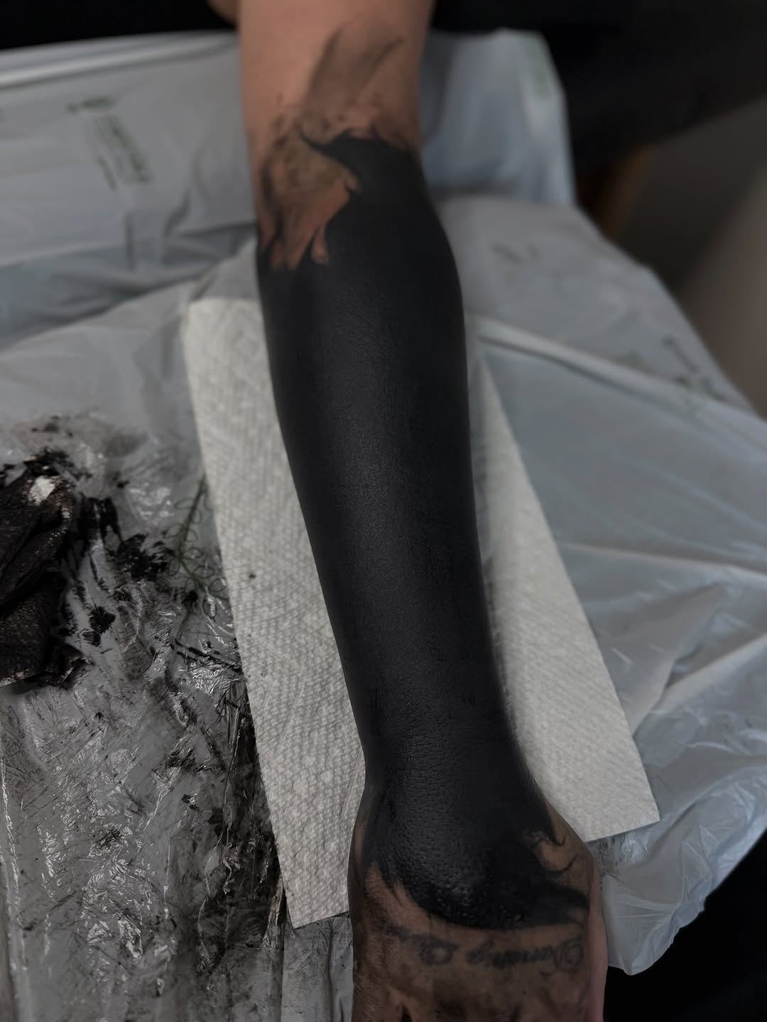 Blackout sleeve tribal tattoo on the forearm by แดแด ๐ฎ๐ท ๐ฆ๐ซ