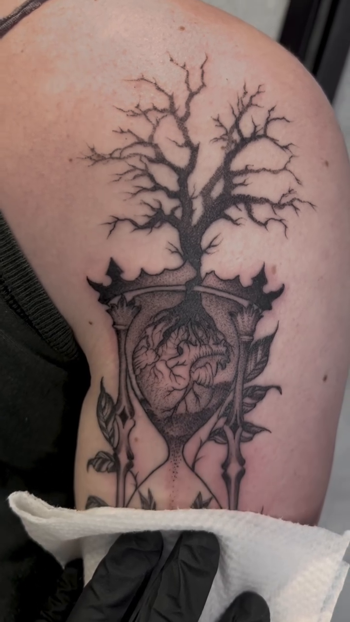 Tattoo by @woodrowtattoo — black_and_grey, realism