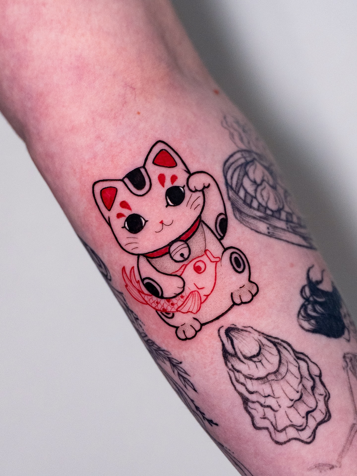 Maneki-neko dotwork tattoo on the forearm by Kalin, Seattle, Washington