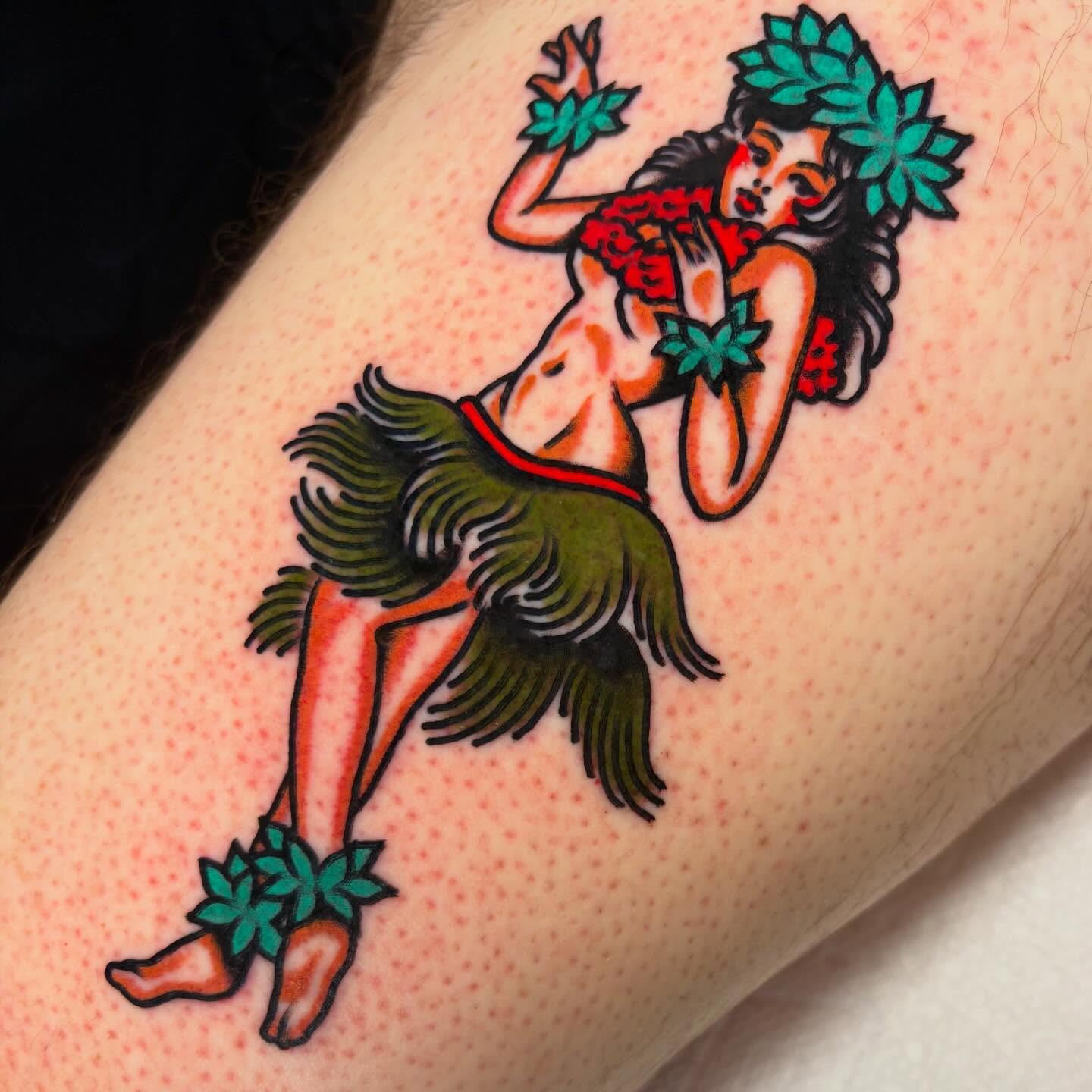 Hula dancer American traditional tattoo on the forearm by Zoe Margot