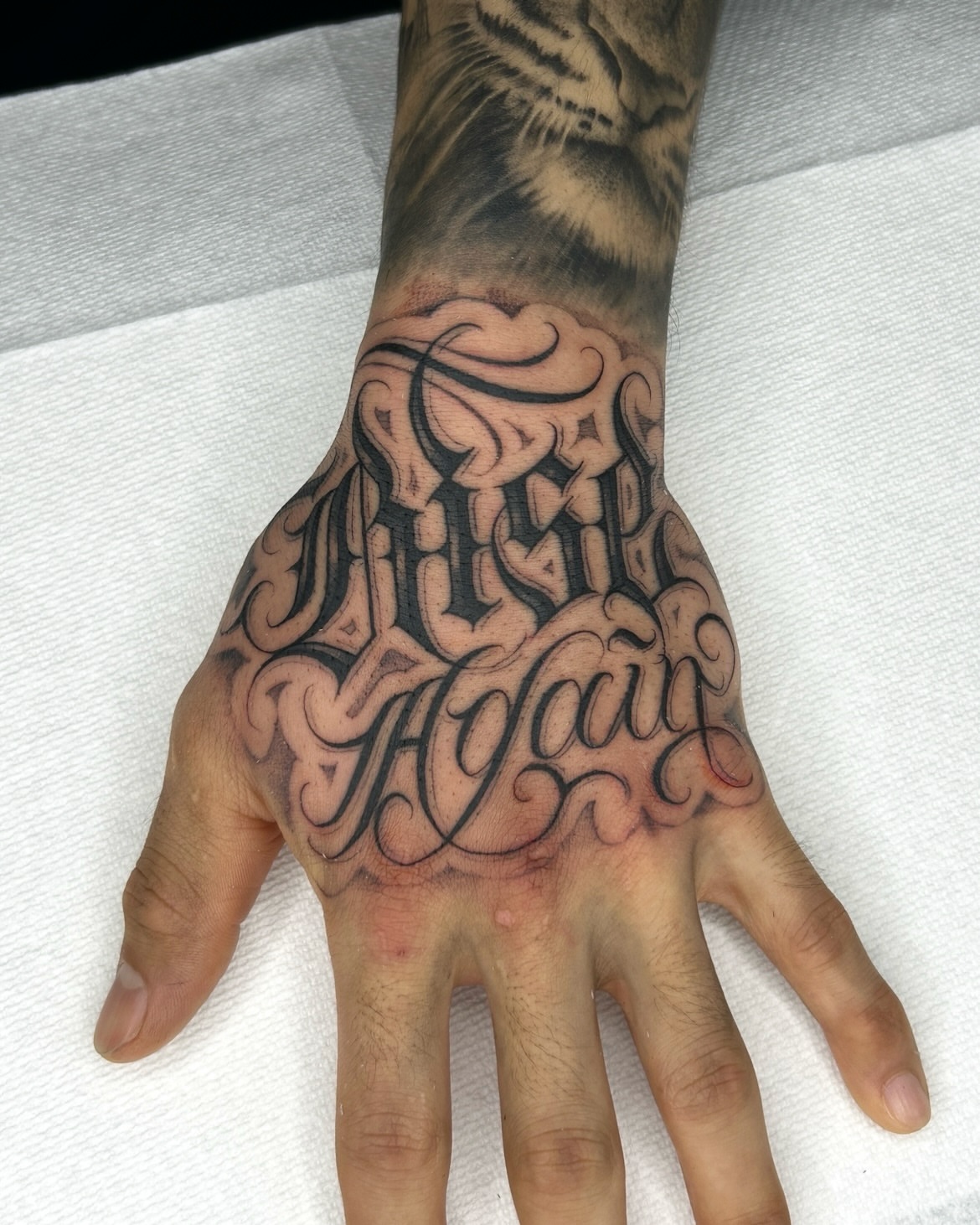 Script lettering lettering script tattoo on the hand by Joon 치카노레터링