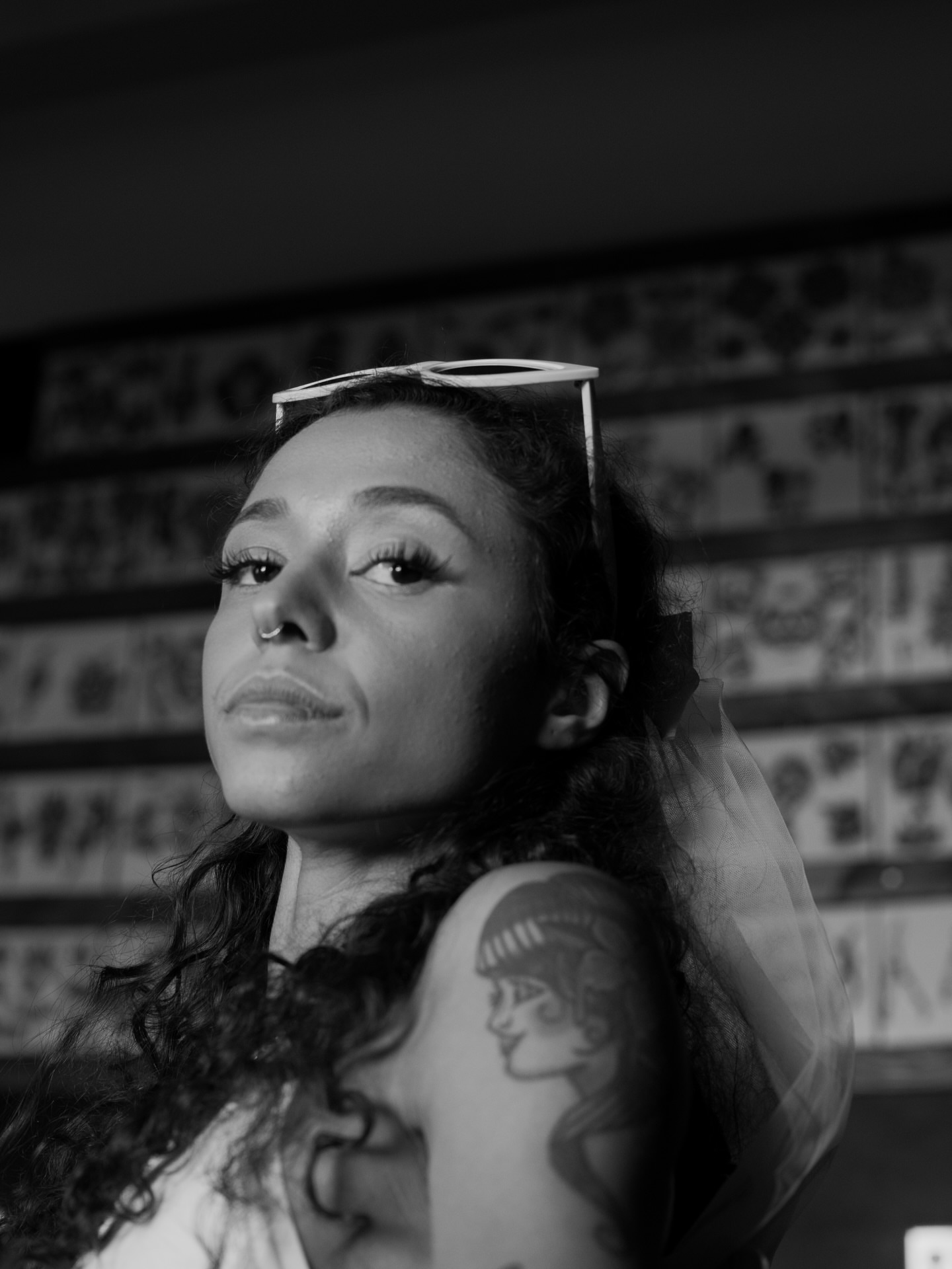 Woman black and grey tattoo on the shoulder by Javin Klingelhoefer Mosley