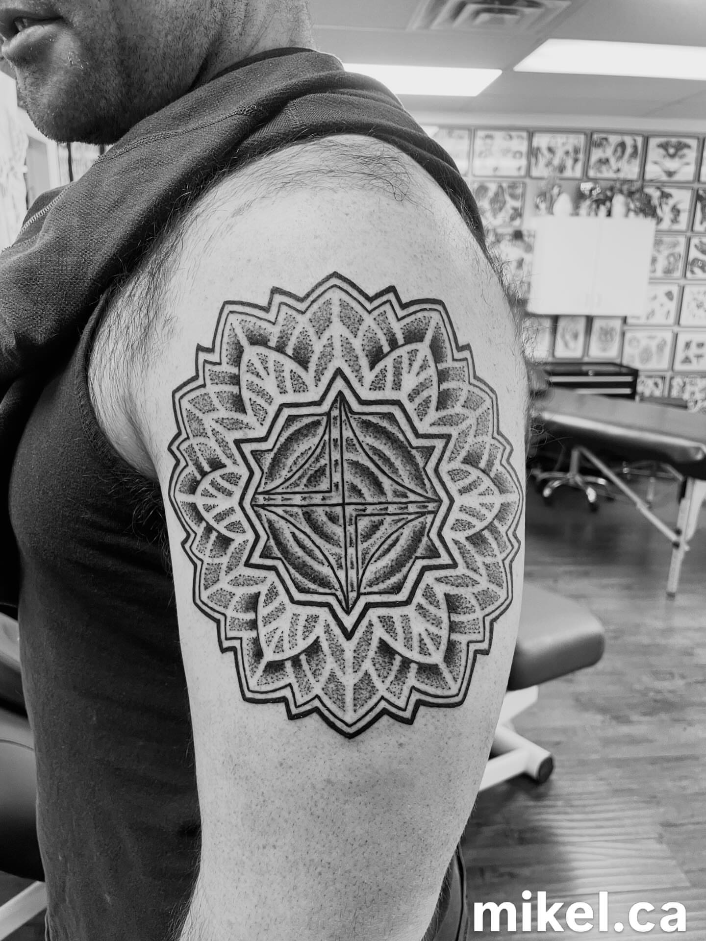 Geometric mandala dotwork tattoo on the shoulder by mikel_tattoosangha