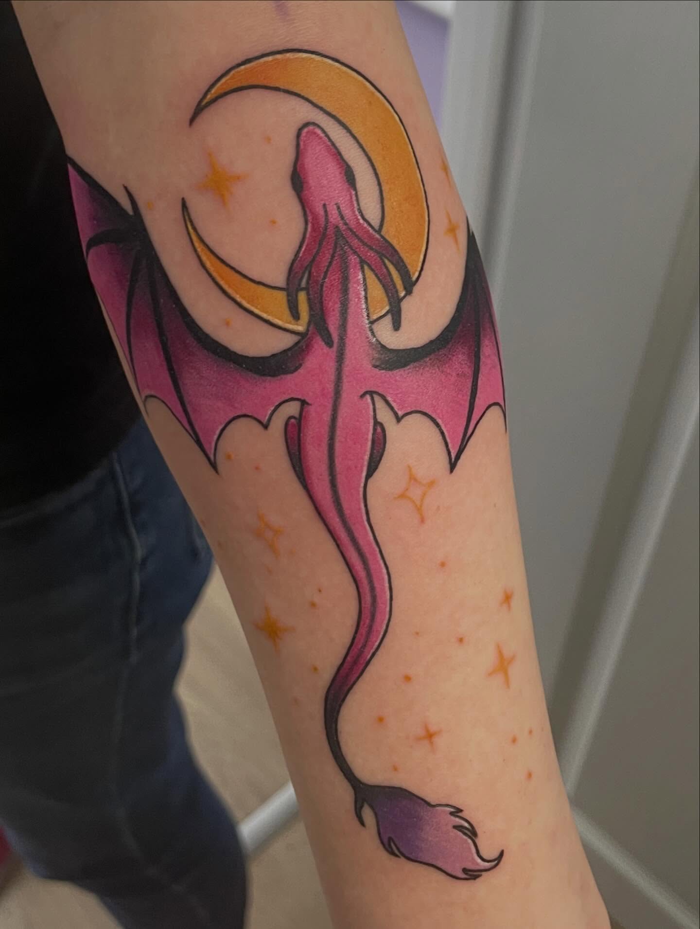Squid and crescent moon new school tattoo on the forearm by elly, Oakham