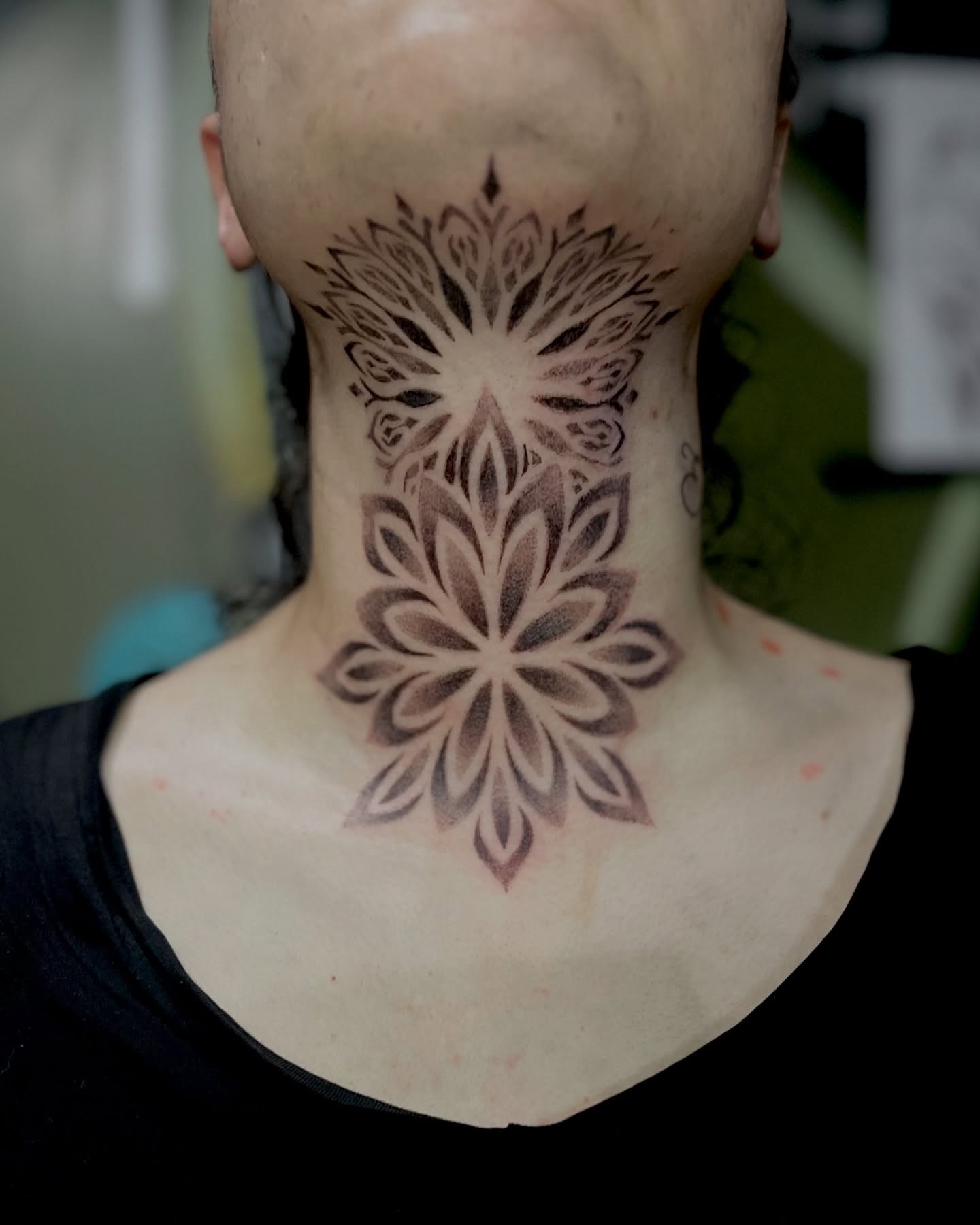 Lotus flower geometric tattoo on the neck by EO, Chicago, Illinois
