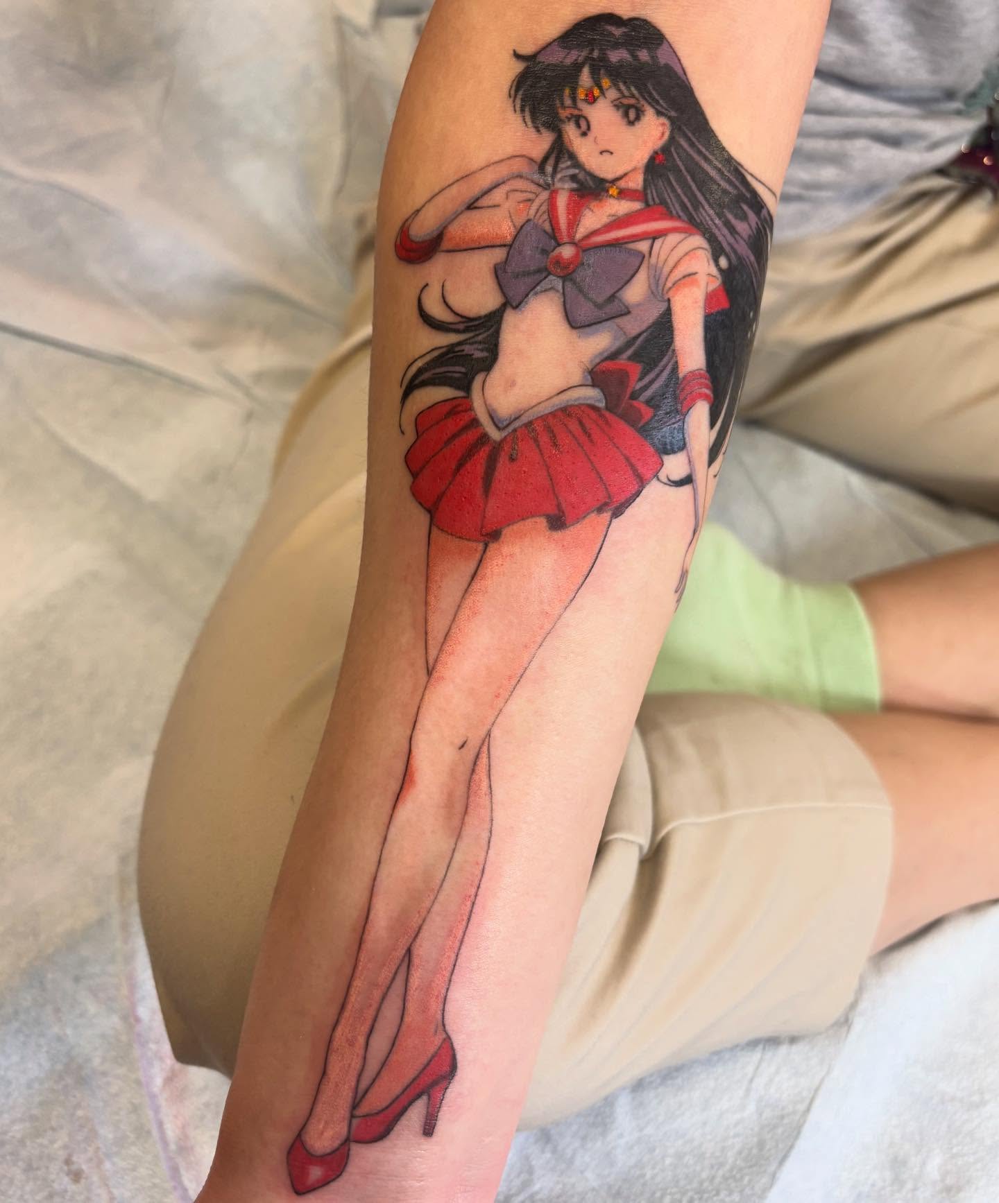 Anime character anime tattoo on the forearm by dayton skuse, Portland, Oregon
