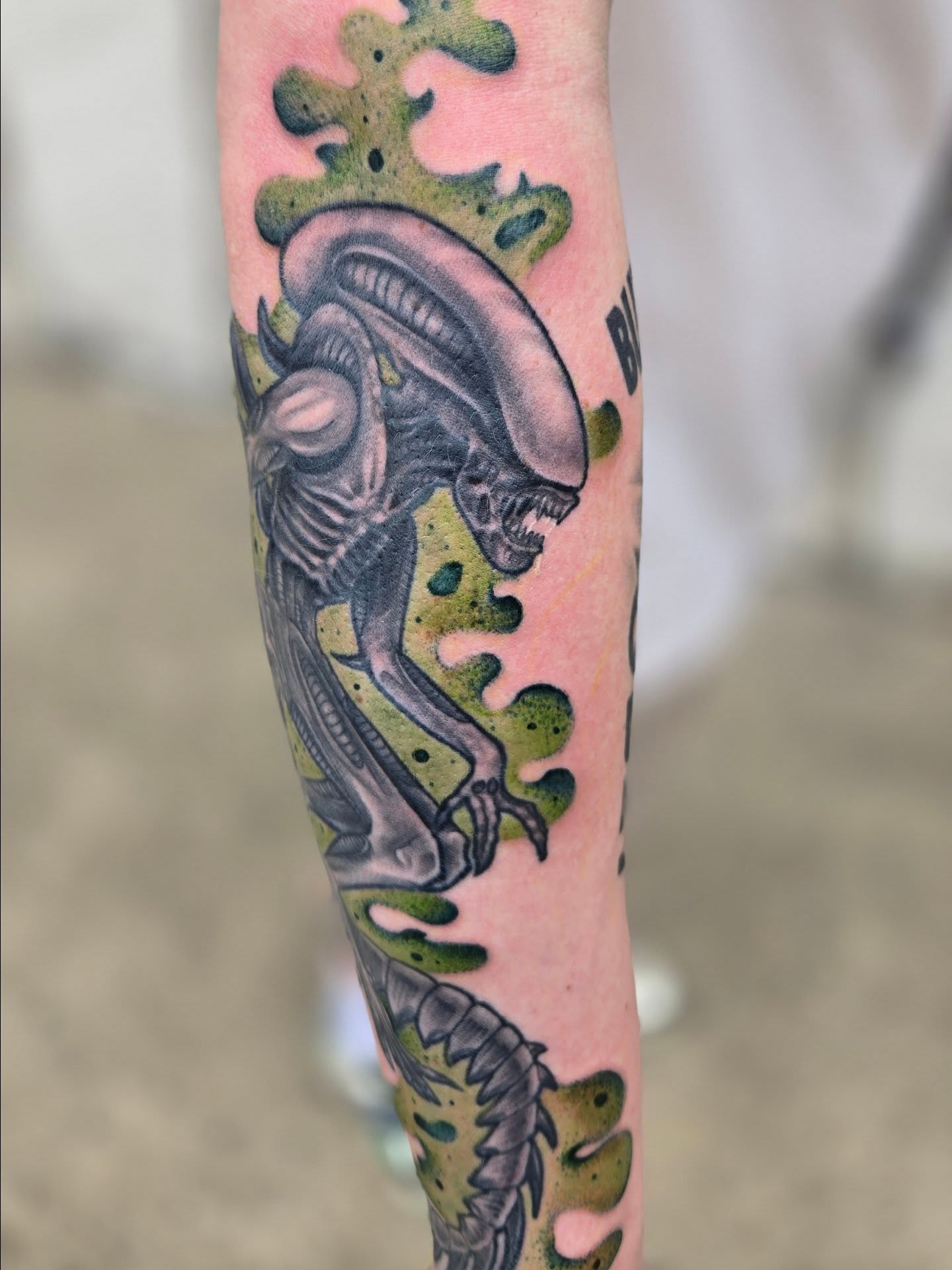 Alien creature American traditional tattoo on the forearm by Angel O'Connor Tattoos
