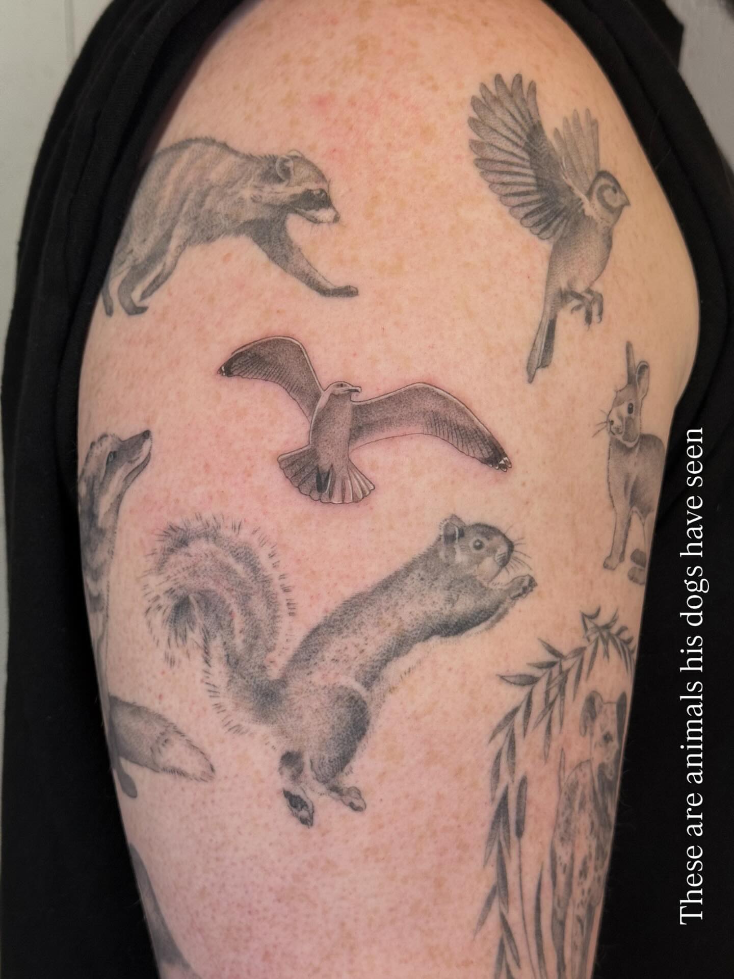 Animals black and grey tattoo on the shoulder by Justin Turkus