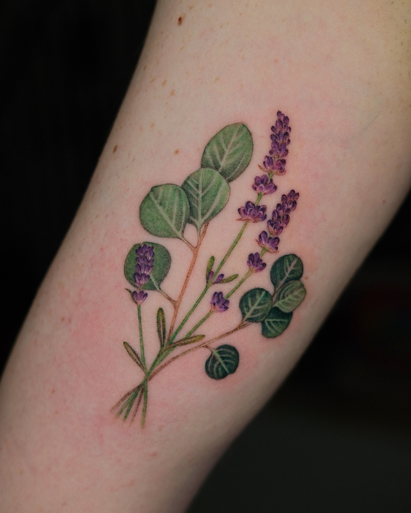 Lavender plant realism tattoo on the forearm by Jiemin Lin