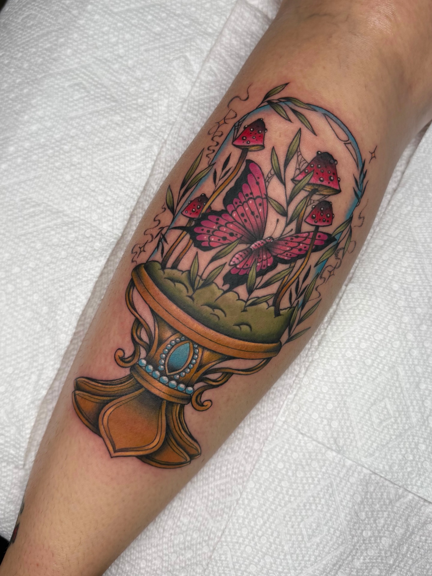Butterfly and mushrooms American traditional tattoo on the forearm by Mara Flores βπΛβ§