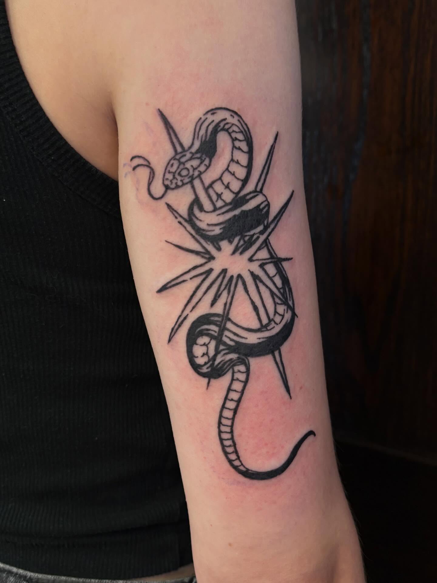 Snake black and grey tattoo on the forearm by kane