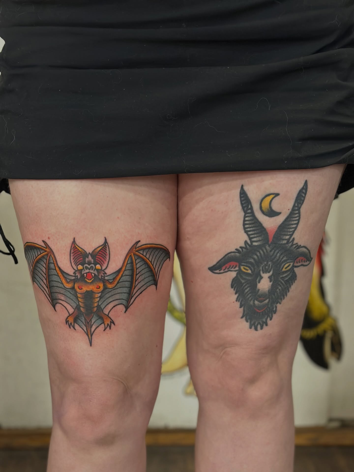 Bat and goat head American traditional tattoo on the thigh by Aaron ulfstam