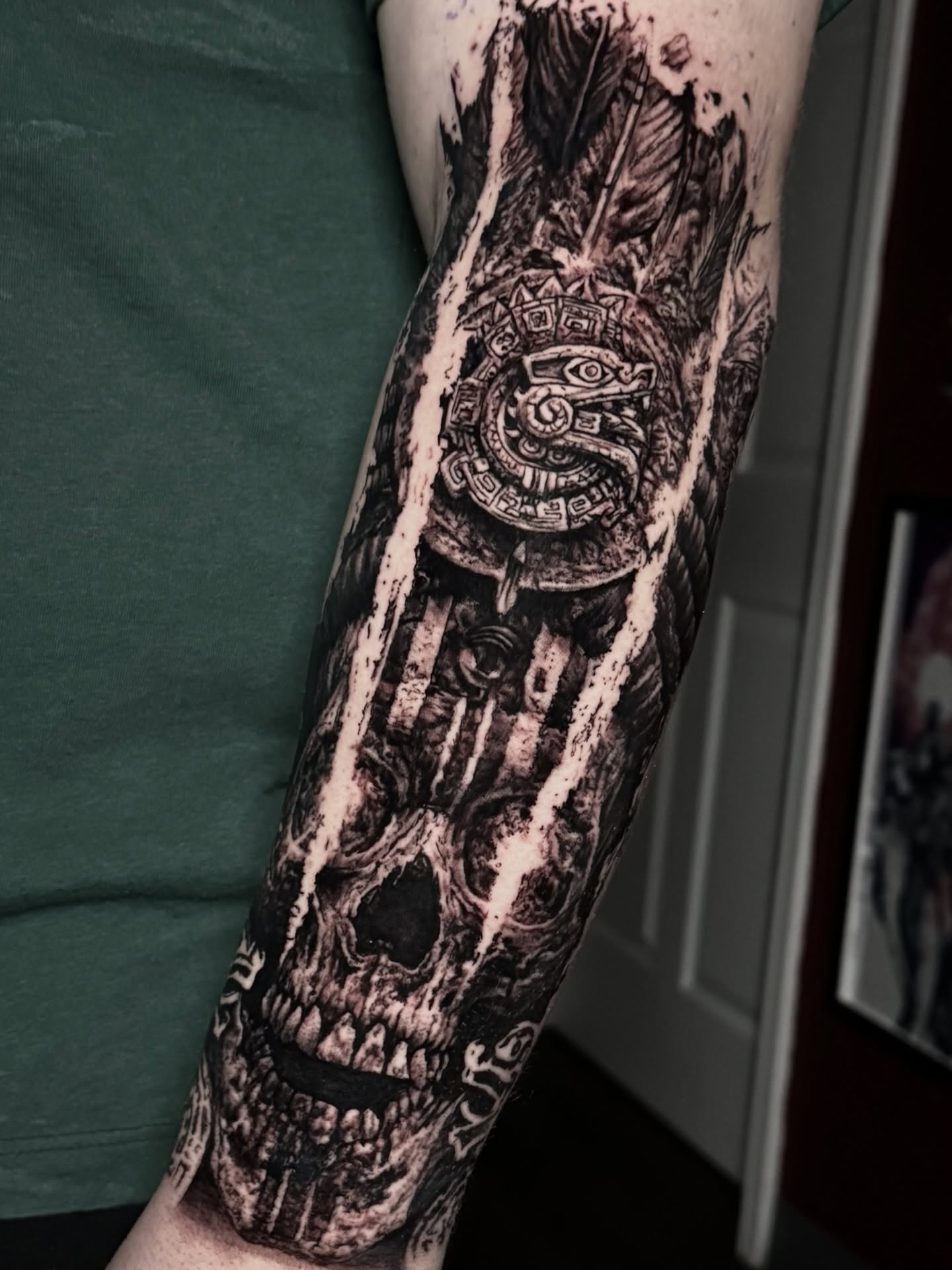 Skull and Mayan calendar realism tattoo on the forearm by Maverick Mayes🕷