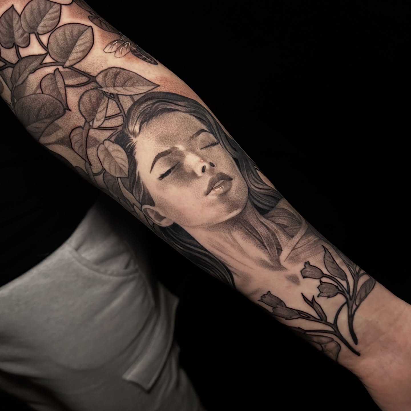 Tattoo by @tattoosandtealeaves — realism, black_and_grey