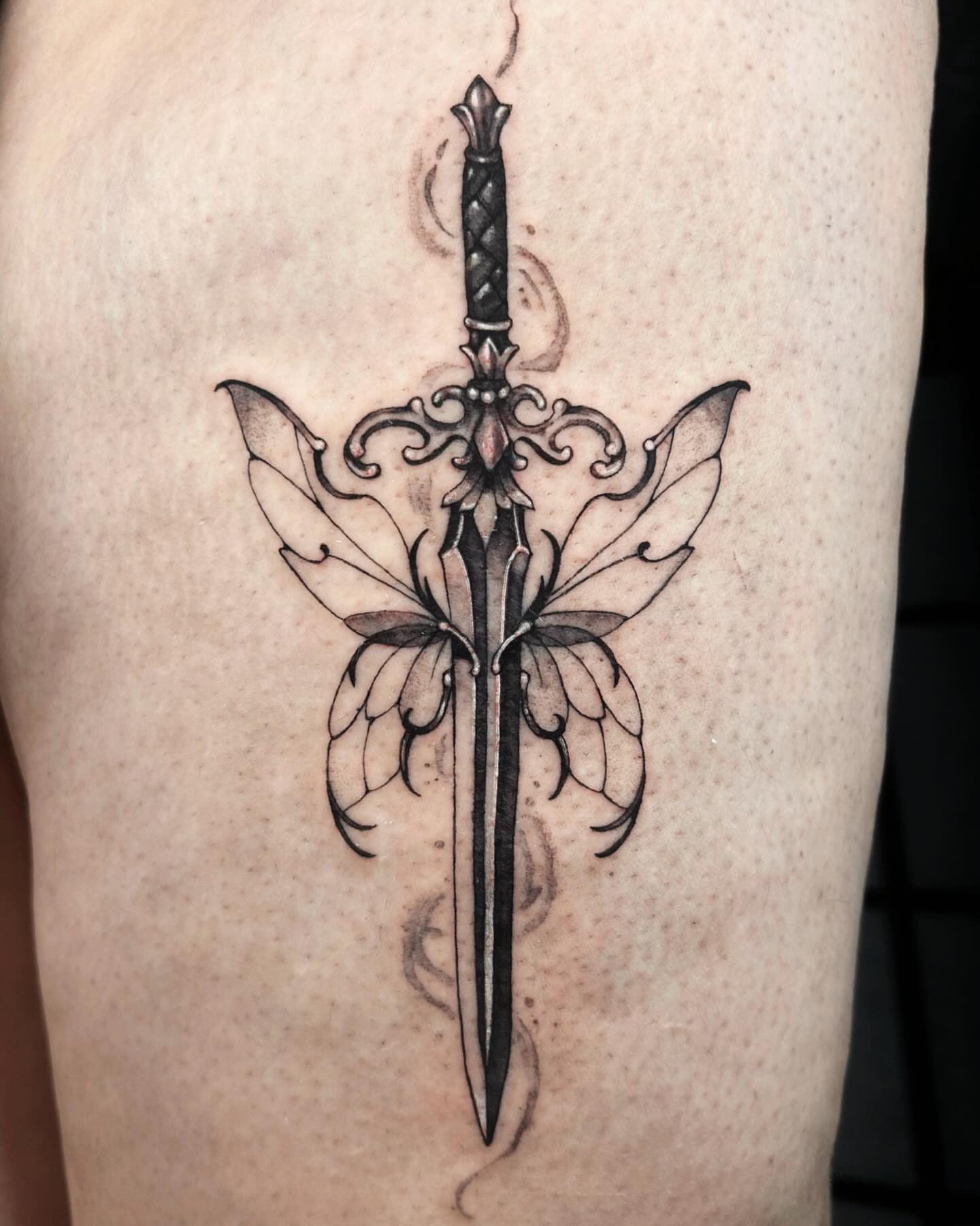 Sword ornamental tattoo on the thigh by 𝔅𝔢𝔩𝔩𝔞