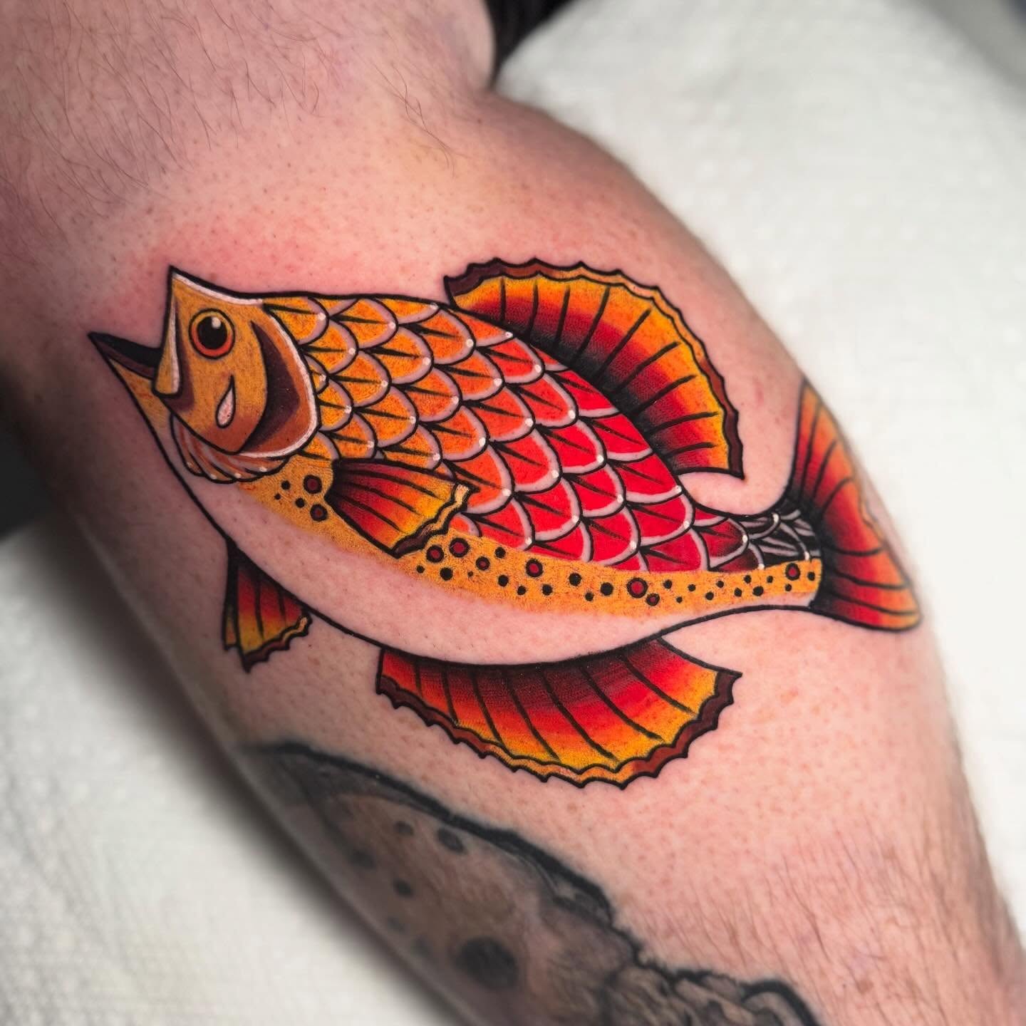 Fish American traditional tattoo on the forearm by Dylan Walker