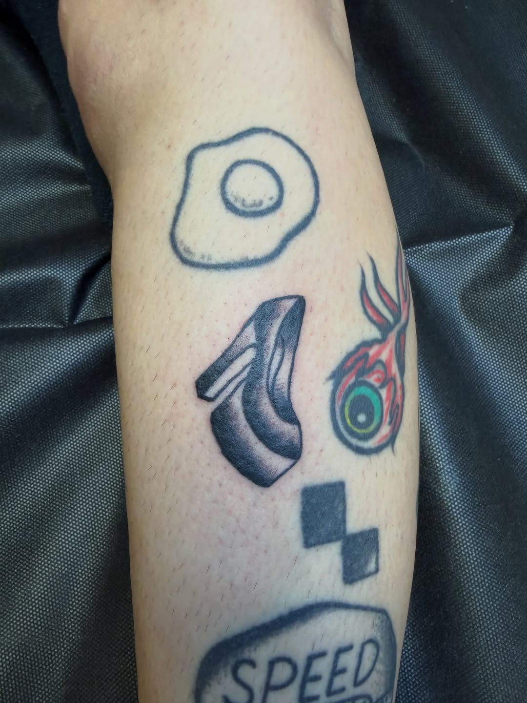 Collection of small tattoos tattoo on the forearm by Nick Tumminello