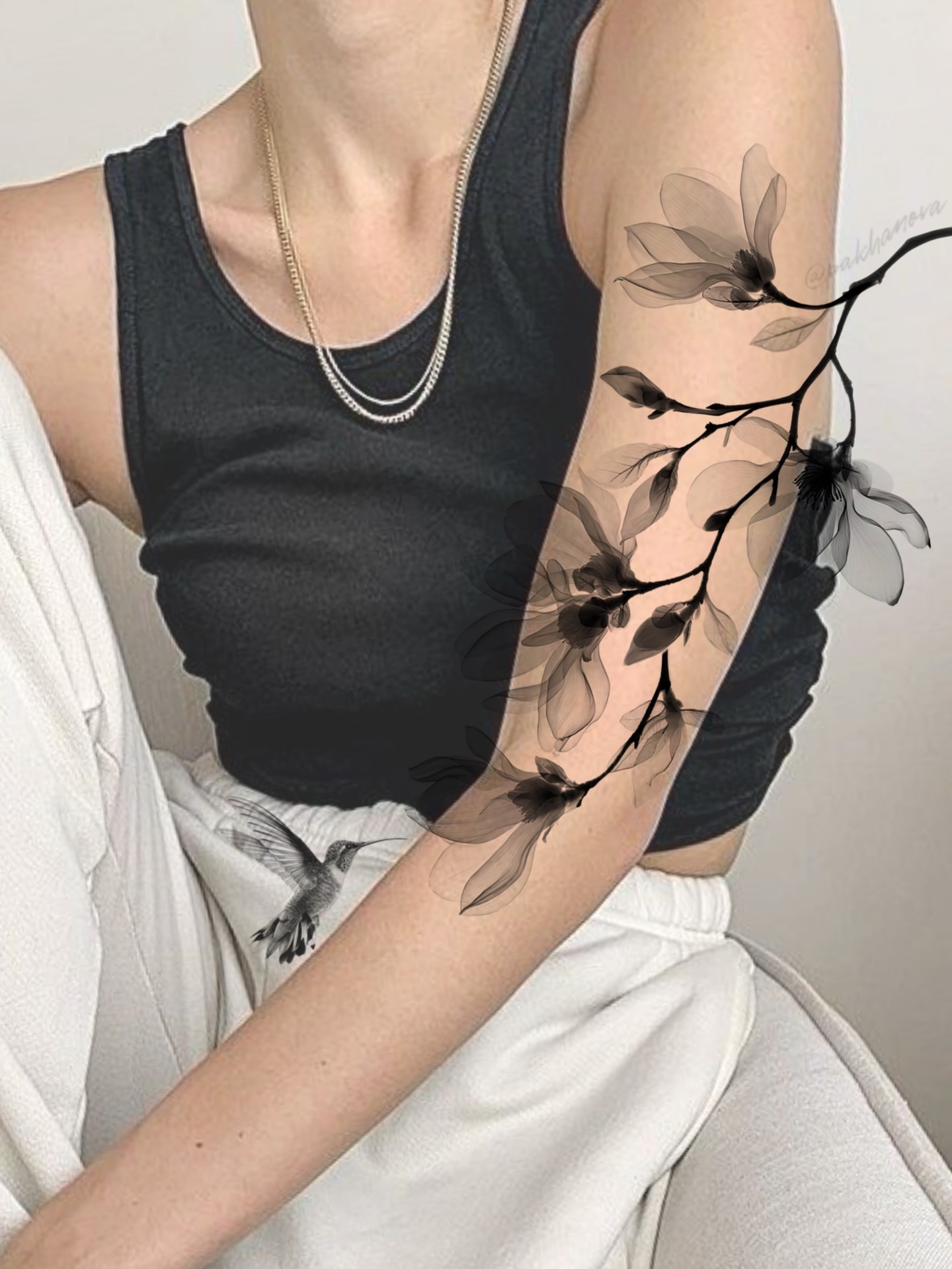 Magnolia branch black and grey tattoo on the forearm by Anastasiia Pakhanova ♥ tattoo artist