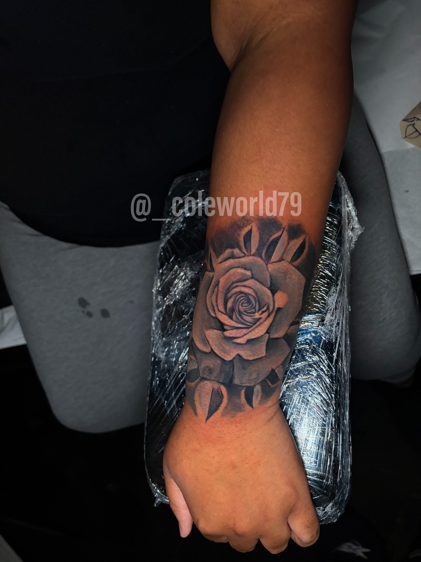Rose black and grey tattoo on the forearm by Chicago tattoo artist