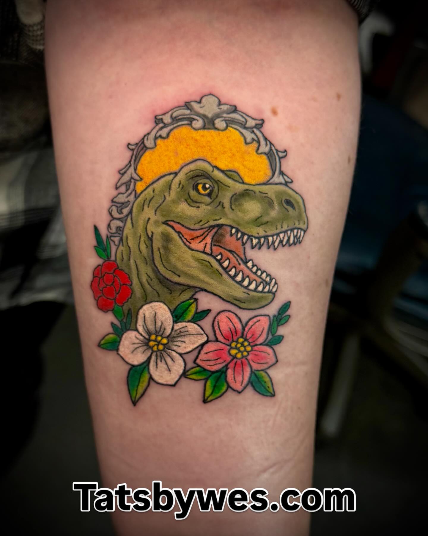 T-Rex with flowers American traditional tattoo on the forearm by 𝐖𝐄𝐒