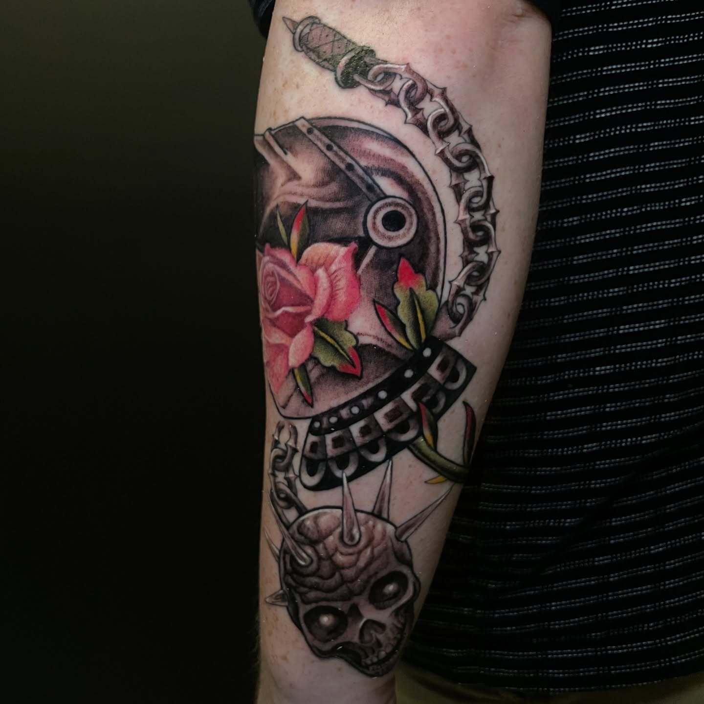 Skull and rose American traditional tattoo on the forearm by Zachary Hayden