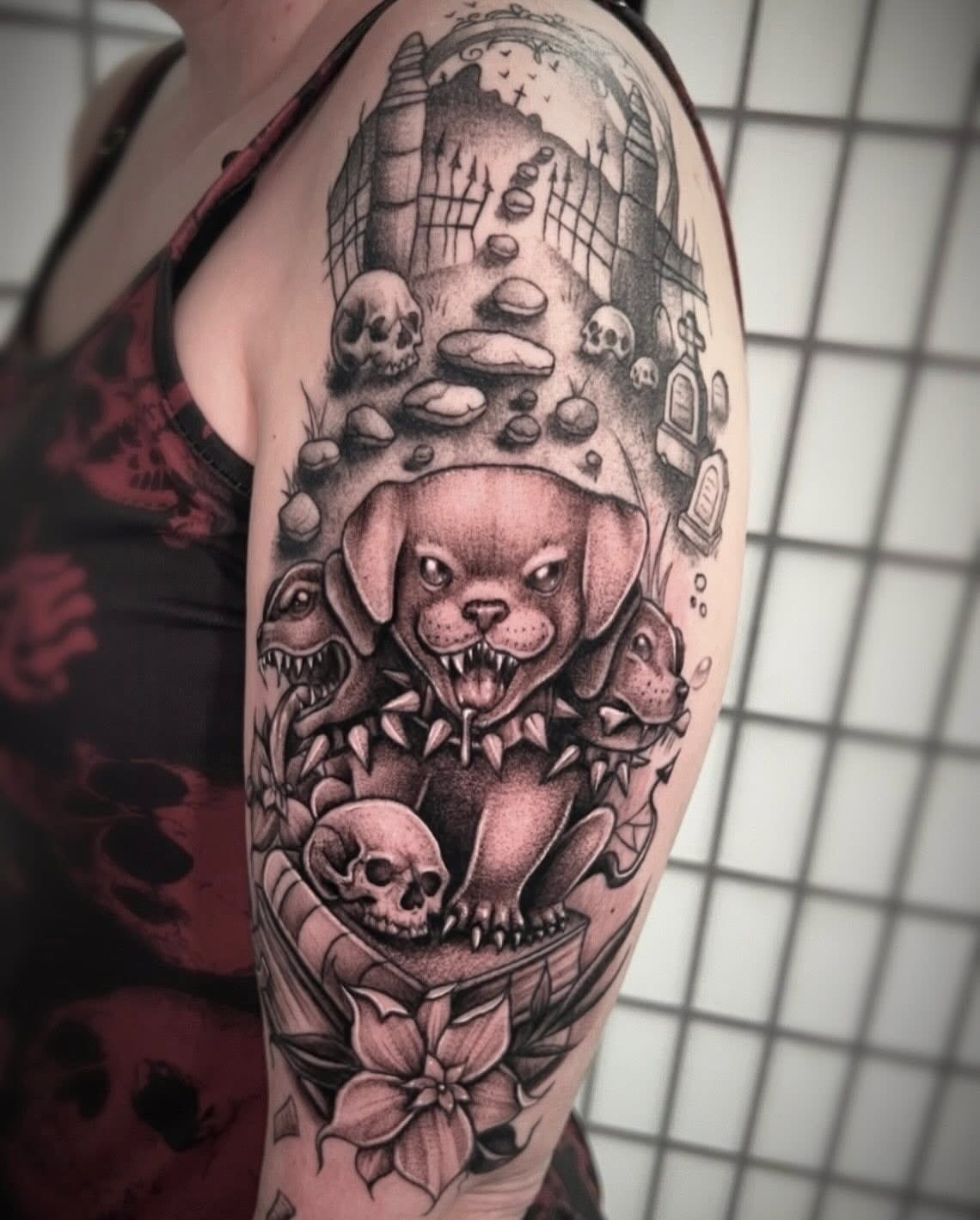 Dog surrounded by skulls dark realism tattoo on the forearm by π·ππ πππππ π·οΈ