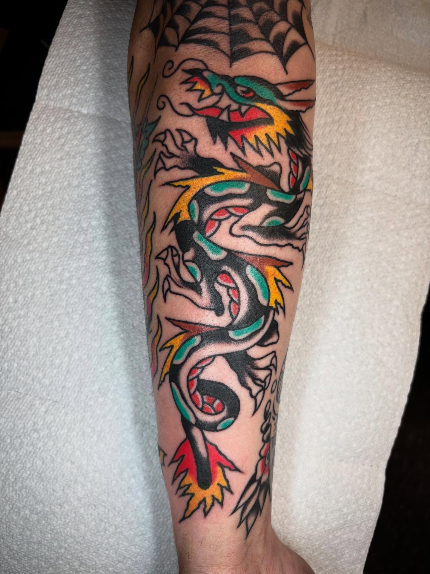 Dragon American traditional tattoo on the forearm by 🌹