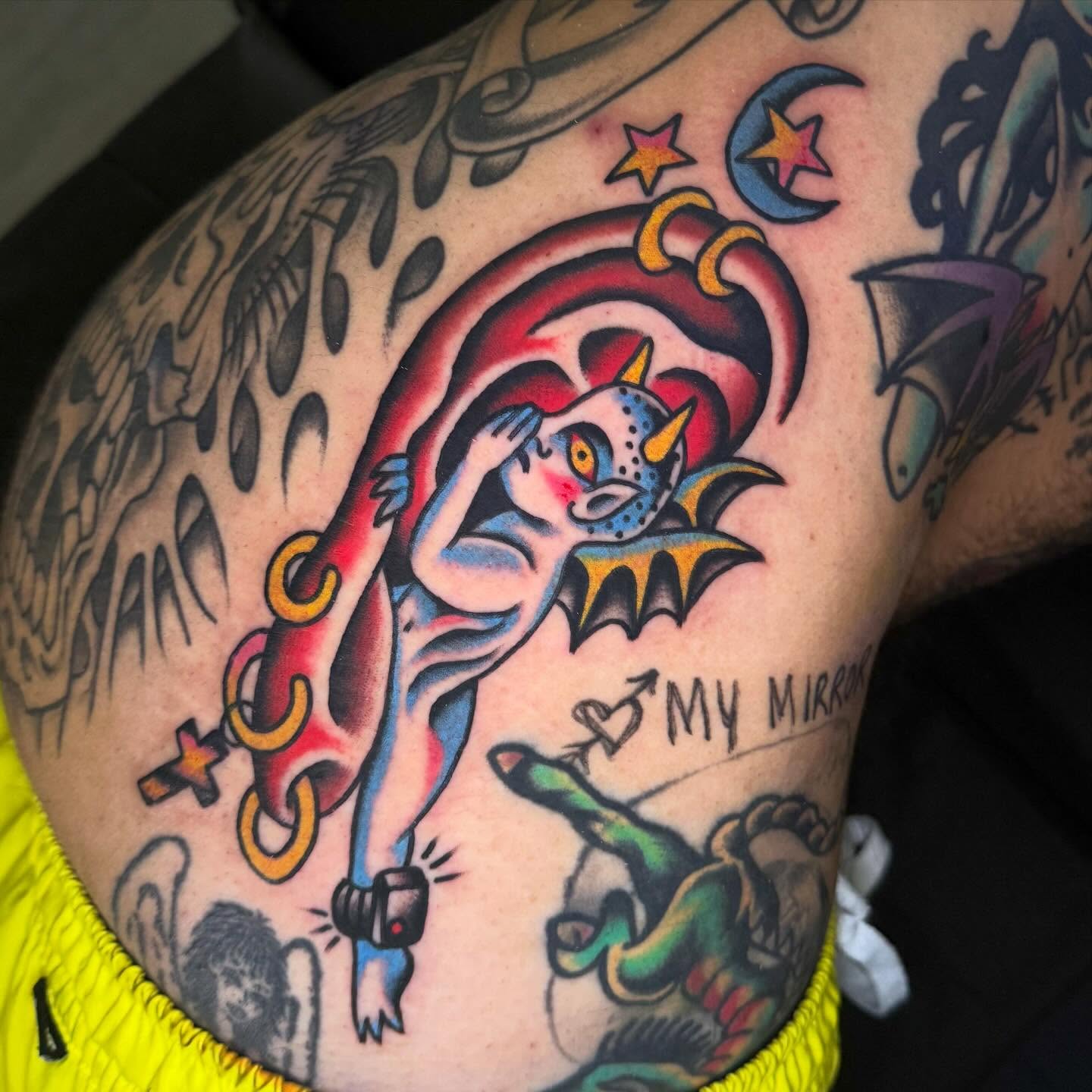 Demon with horns American traditional tattoo on the thigh by Julia Louise