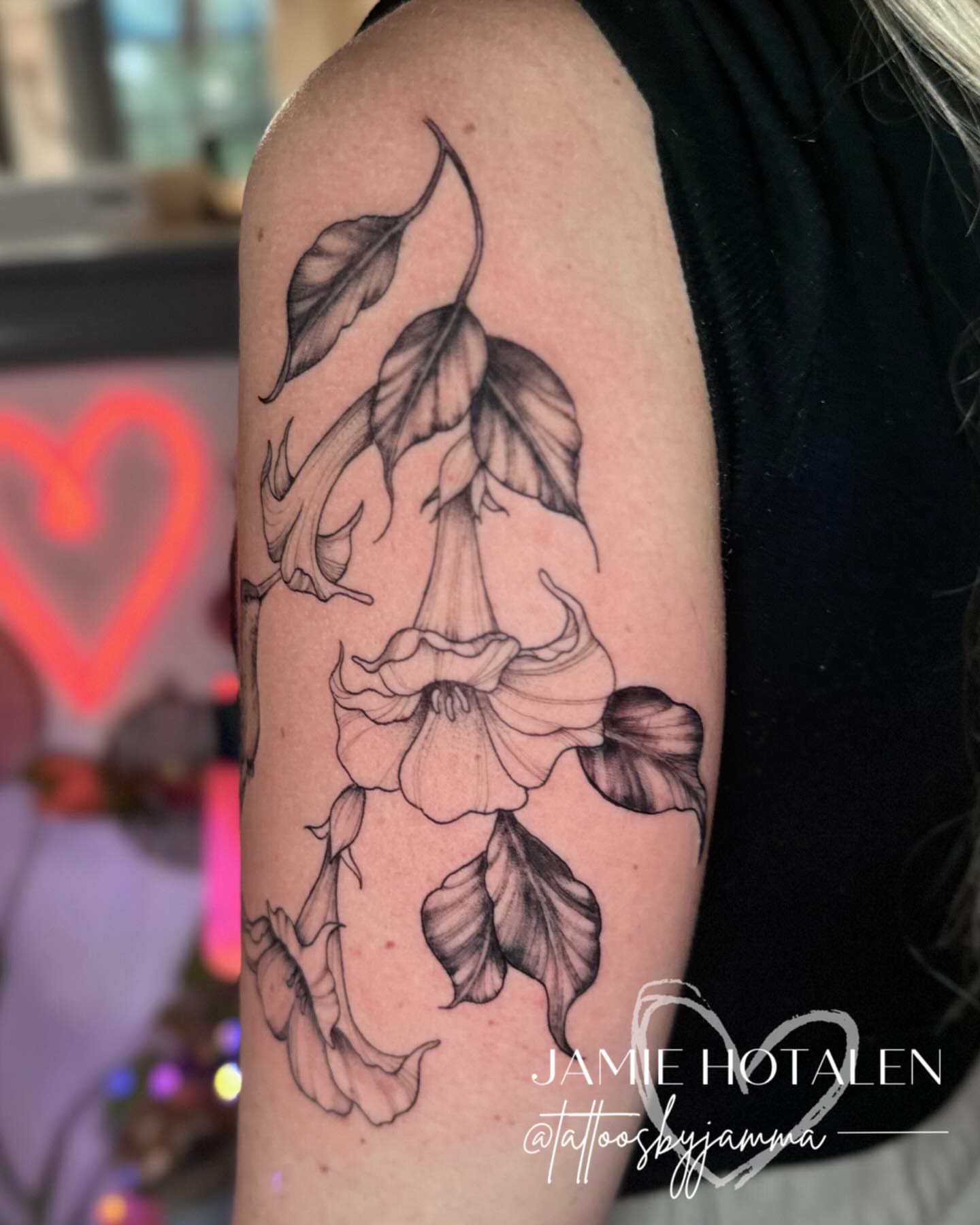 Bell-shaped flowers realism tattoo on the upper arm by πππππππ π½π² ππππππ π°πππππ π πΉππππ π·ππππππβ¨